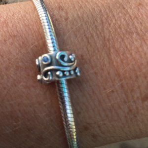Pandora Clip swirl with 4 light blue stones